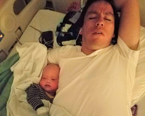 father and son sleeping in hospatial