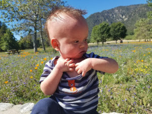 sick child in nature searching for naturopath