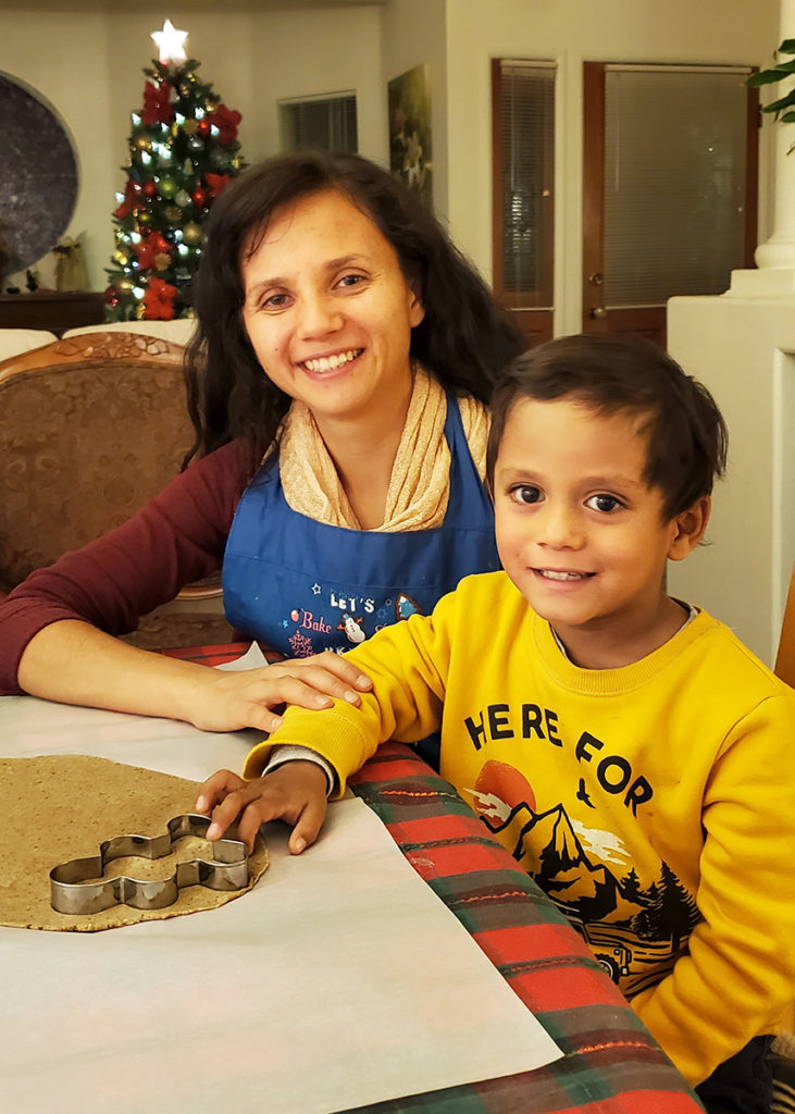 mom and son making cookies